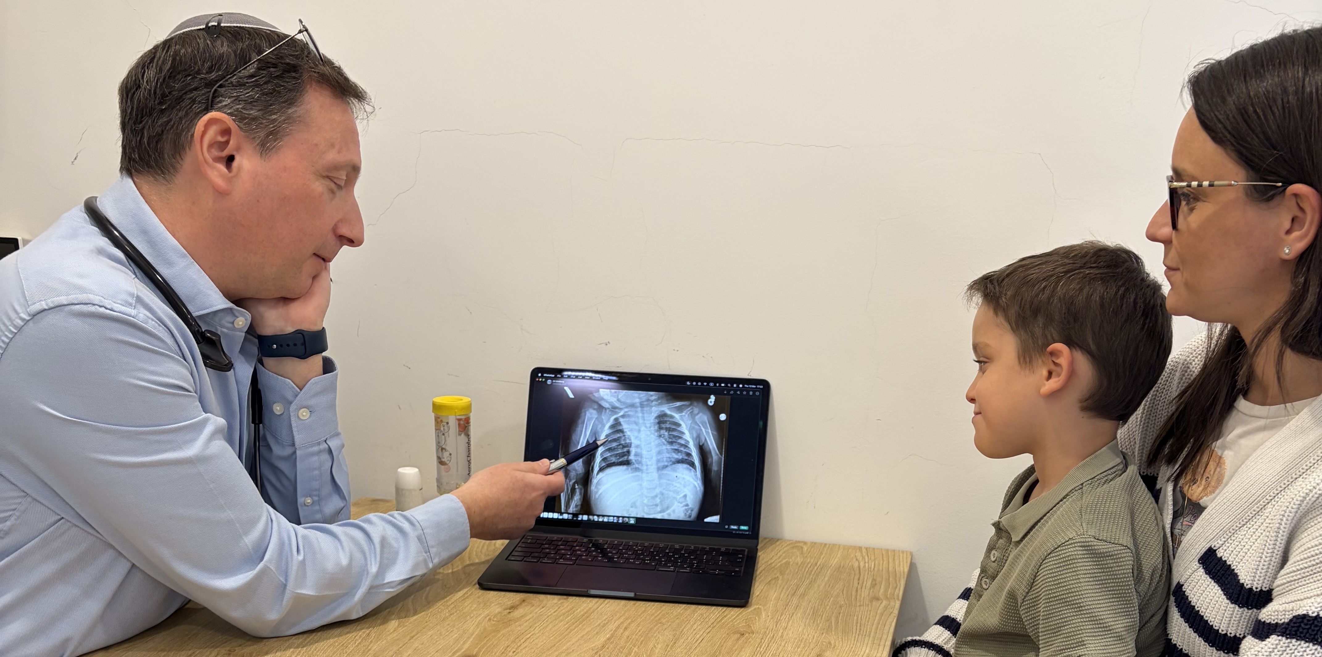 Dr. Patrick Stafler with child